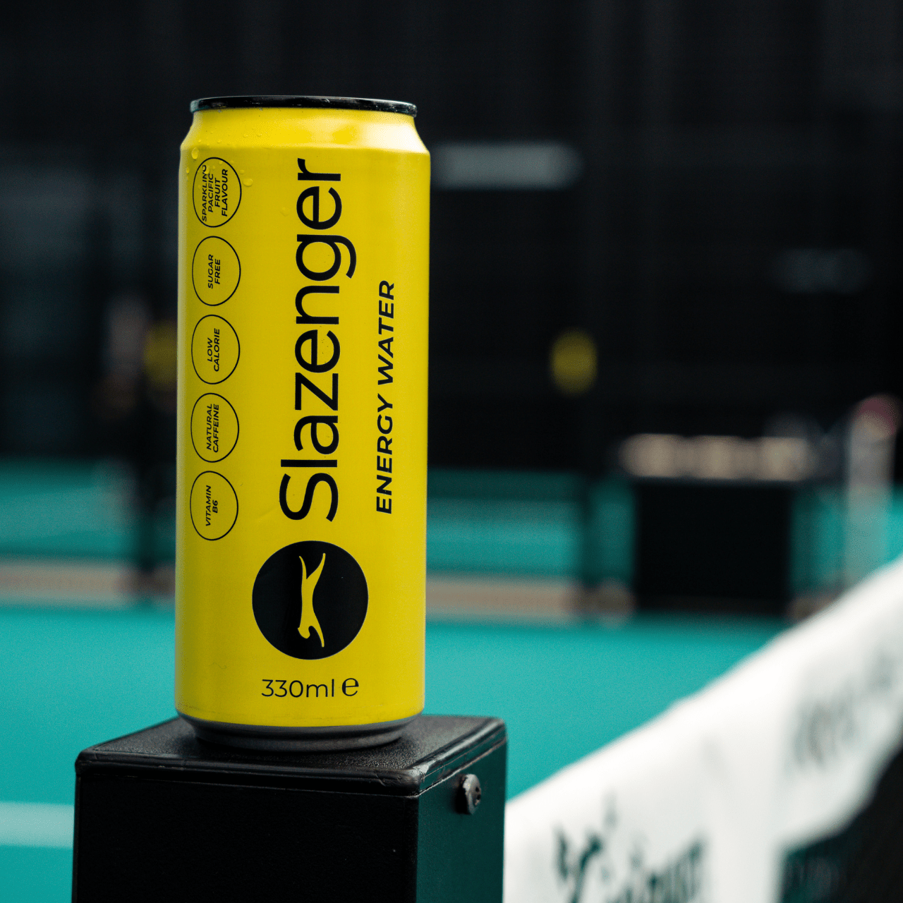 Slazenger Energy Water can standing on a net post