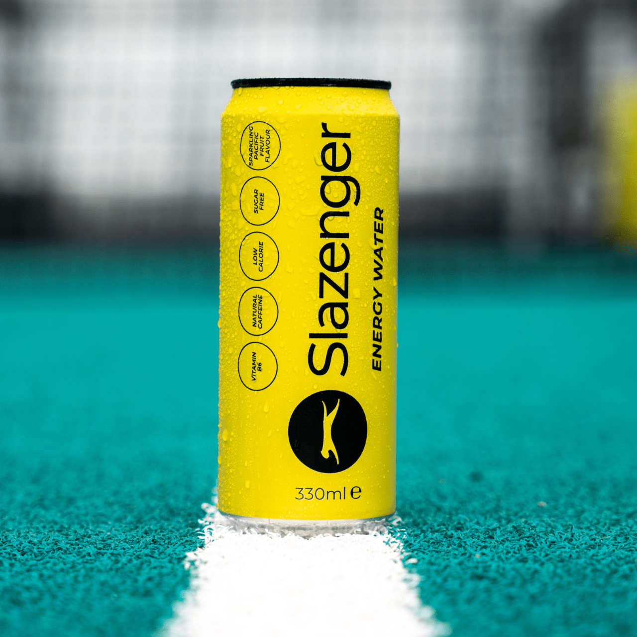 Slazenger Energy Water can in the middle of Padel court